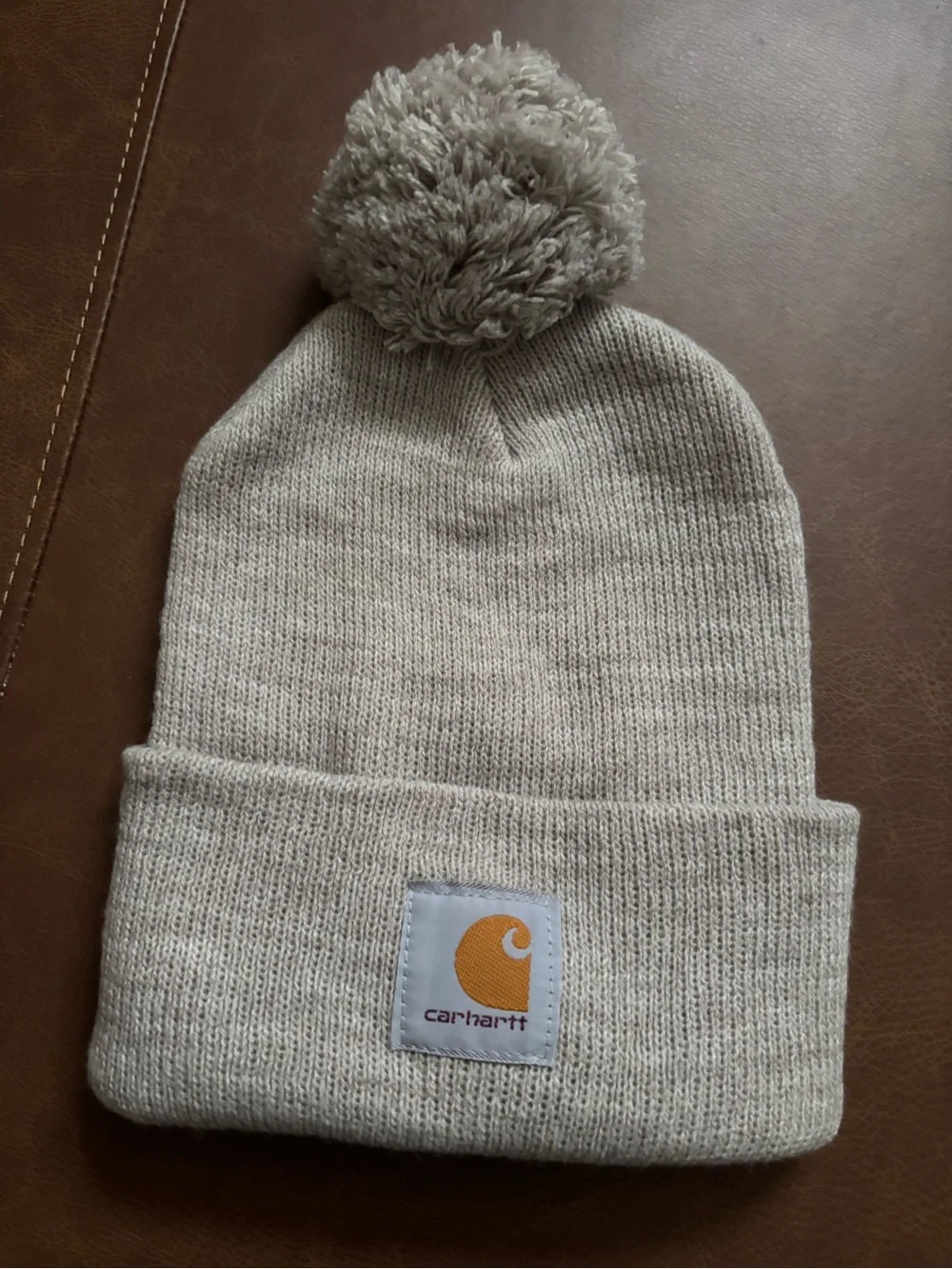 Carhartt Pom Beanie Hat in Light Gray with Orange Logo
